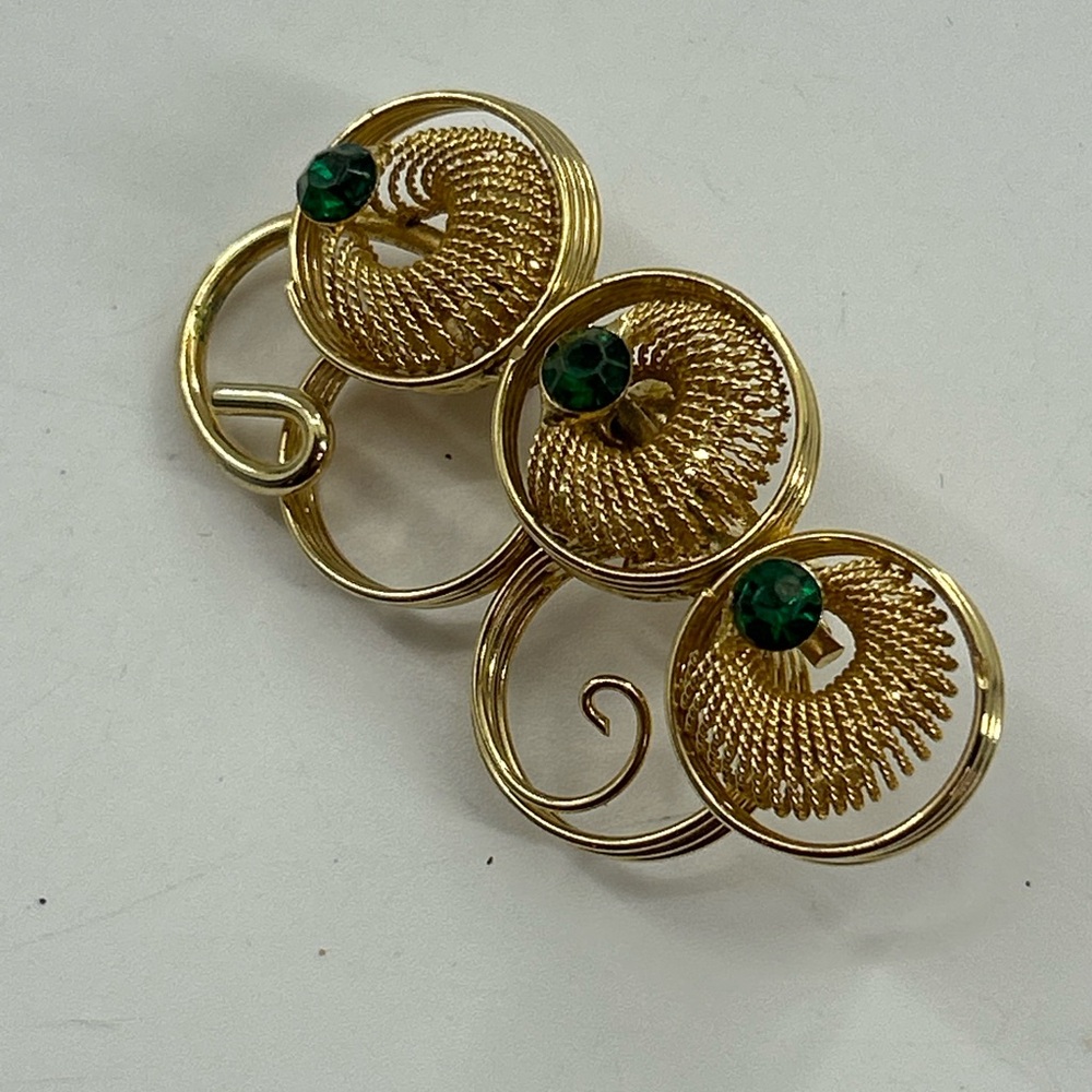 Elegant Gold tone and Green Swirl Brooch vintage grannycore green rhinestone